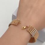 ⁦إسوارة ذهب دوريكا عريضة عيار 21 وزن 30.03 جم  فخامة تلفت الأنظار⁩ - الصورة ⁦2⁩