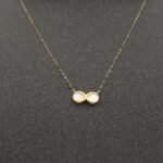 ⁦عقد وإسواره  وجهتين ذهب عيار 18 الوزن 1.06 جرام⁩ - الصورة ⁦4⁩