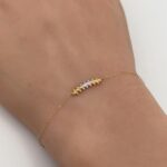 ⁦اسواره ذهب عيار 18 وزن 0.50 جرام لمسة ذهبية راقية⁩ - الصورة ⁦2⁩