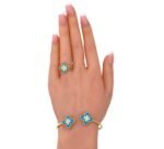 اسوار وخاتم ذهب عيار 18 وزن 10.00 جرام بتصميم روبرتو كوين باللون الأزرق الفيروزي الجذاب