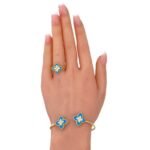 اسوار وخاتم ذهب عيار 18 وزن 10.00 جرام بتصميم روبرتو كوين باللون الأزرق الفيروزي الجذاب