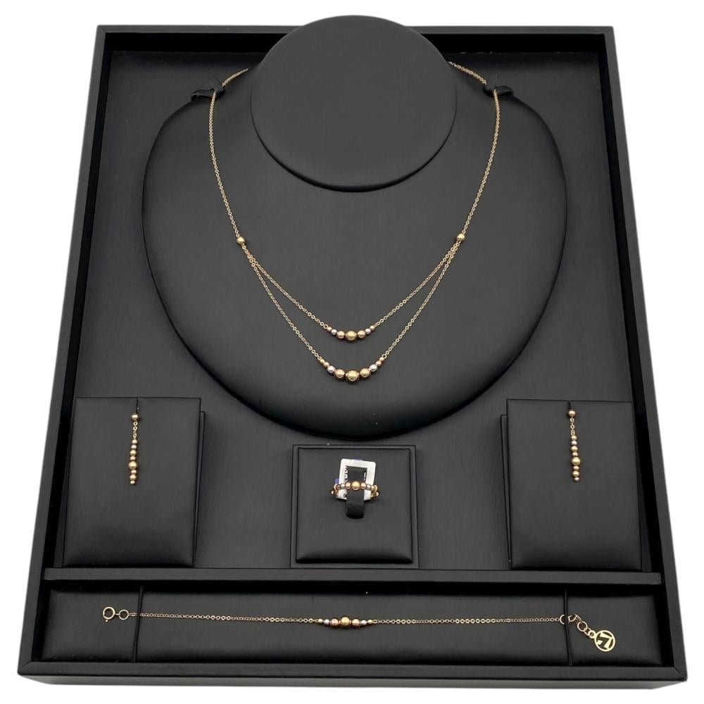 طقم ذهب عيار 18 وزن 7.98 جم تصميم كرات فخمة تليق بك لإطلالة ساحرة طقم ذهب عيار 18 وزن 7.98 جم تصميم كرات فخمة تليق بك لإطلالة ساحرة