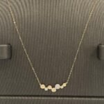 ⁦نصف طقم أطفال ذهب عيار 18 الوزن 1.54 جرام⁩ - الصورة ⁦2⁩