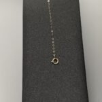 ⁦عقد وإسواره ذهب عيار 18 الوزن 0.88 جرام⁩ - الصورة ⁦3⁩