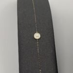 ⁦عقد وإسواره ذهب عيار 18 الوزن 0.86 جرام⁩ - الصورة ⁦3⁩