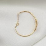 ⁦اسواره مواليد ذهب عيار 18 الوزن 1.68 جرام⁩ - الصورة ⁦2⁩