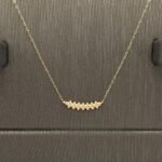 ⁦نصف طقم اطفال ذهب عيار 18 الوزن 1.29 جرام⁩ - الصورة ⁦2⁩