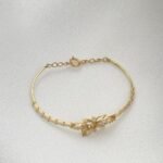 ⁦اسواره مواليد ذهب عيار 18 الوزن 2.33 جرام⁩ - الصورة ⁦2⁩