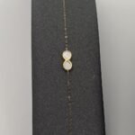 ⁦عقد وإسواره  وجهتين ذهب عيار 18 الوزن 1.06 جرام⁩ - الصورة ⁦2⁩