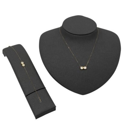 عقد وإسواره وجهتين ذهب عيار 18 الوزن 1.06 جرام