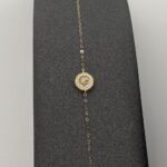 ⁦عقد وإسواره ذهب عيار 18 الوزن 1.21 جرام⁩ - الصورة ⁦2⁩