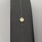 ⁦عقد وإسواره ذهب عيار 18 الوزن 0.97 جرام⁩ - الصورة ⁦3⁩