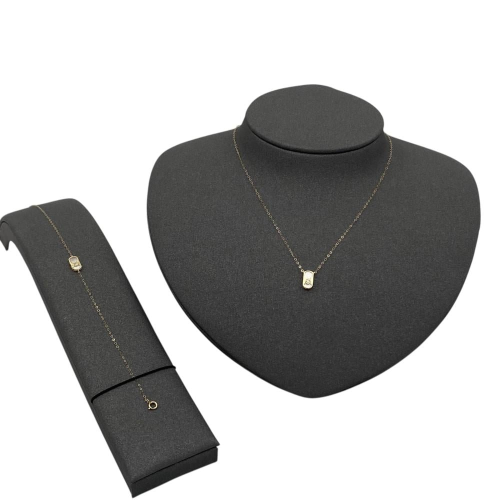 عقد وإسواره ذهب عيار 18 الوزن 0.87 جرام عقد وإسواره ذهب عيار 18 الوزن 0.87 جرام