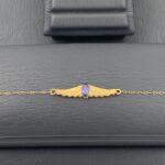 ⁦طقم جناح الصقر ذهب عيار 21 وزن 3.50 جرام بفص ازرق راق⁩ - الصورة ⁦5⁩
