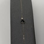 ⁦عقد وإسواره ذهب عيار 18 الوزن 0.88 جرام⁩ - الصورة ⁦2⁩