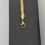 ⁦عقد وإسواره ذهب عيار 18 الوزن 15.83 جرام⁩ - الصورة ⁦2⁩