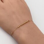 ⁦اسواره ذهب عيار 18 وزن 0.50 جرام تصميم بسيط أنيق⁩ - الصورة ⁦3⁩