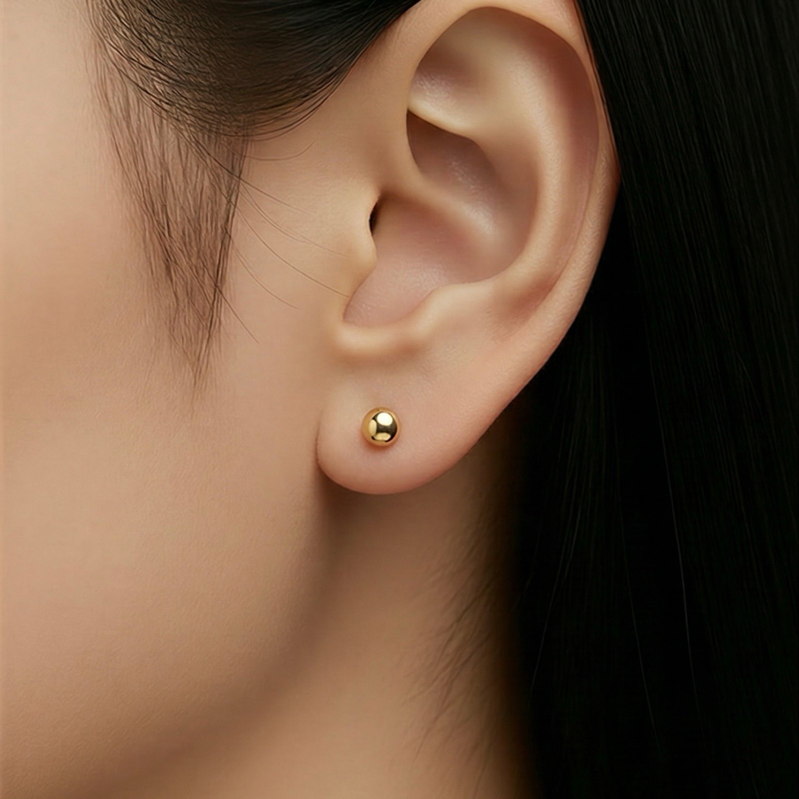 img_2070 حلق ذهب عيار 18 الوزن 1.25 جرام - الصورة 1