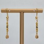 ⁦حلق ذهب عيار 21 الوزن 1.71 جرام⁩ - الصورة ⁦2⁩