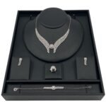 طقم ابيض ذهب عيار 18 الوزن 23.93 جرام