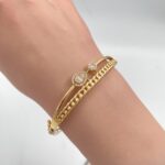⁦أسواره وخاتم ذهب عيار 18 الوزن 11.34 جرام⁩ - الصورة ⁦3⁩